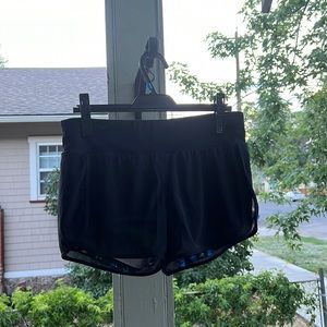 Black Fabletic athletic shorts. Size small. Spandex shorts under baggy shorts.